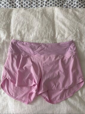 Pink 4 inch lululemon speed up shorts 14